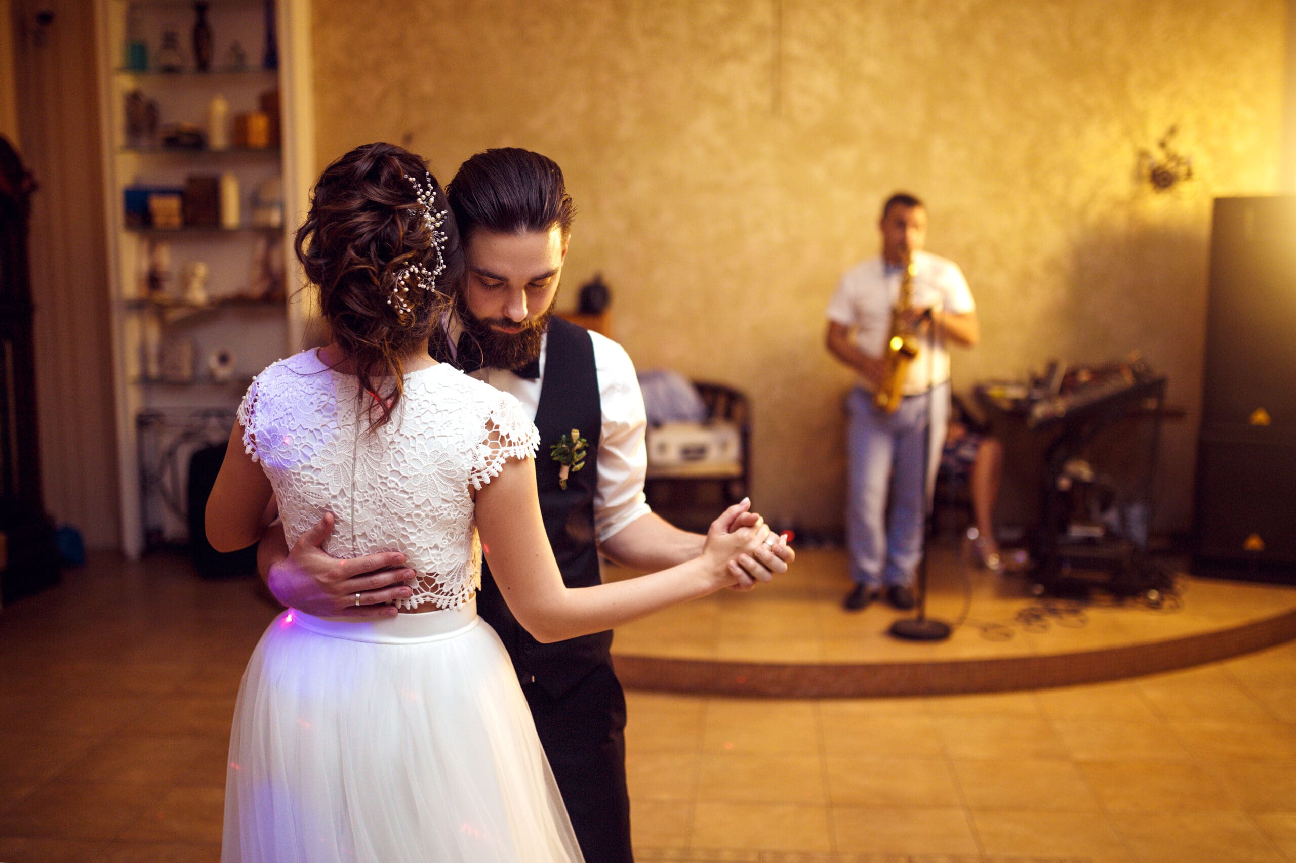 Bride and groom cutting their wedding cake